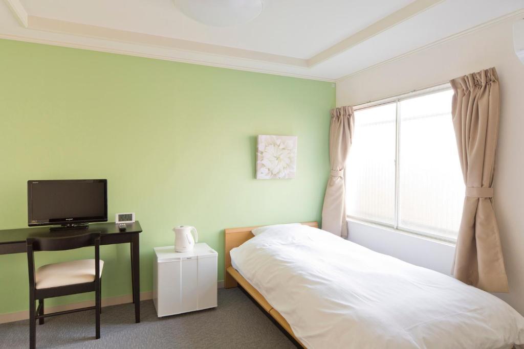 Shin-Okubo City Hotel Τόκιο Δωμάτιο φωτογραφία
